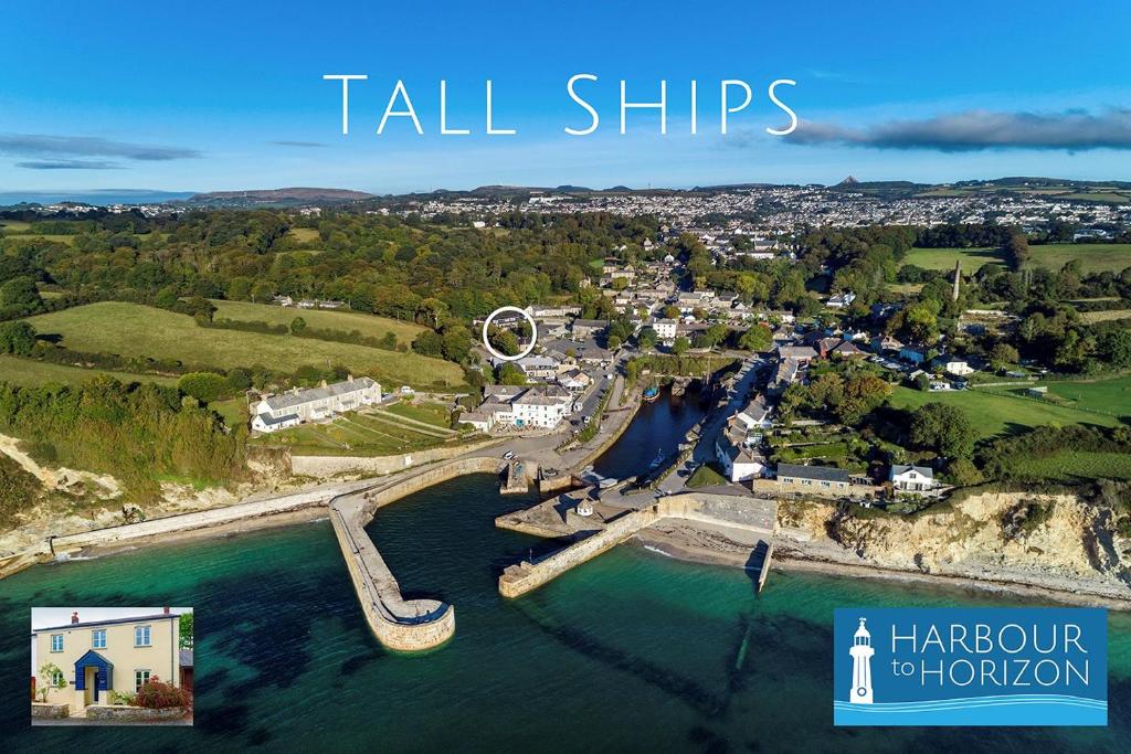 an aerial view of a river with a town at Tall Ships, Charlestown - two ticks from the harbour in Charlestown