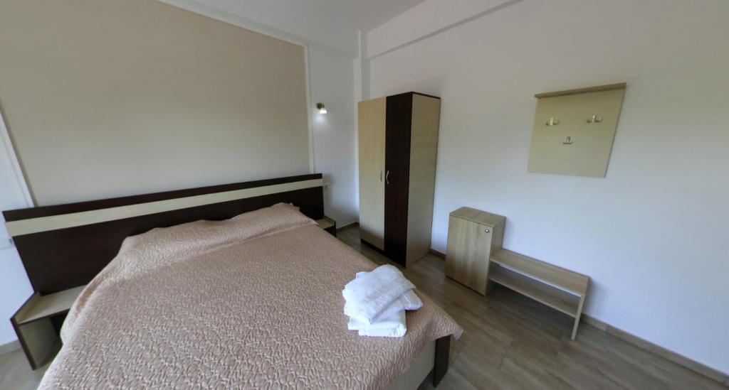 Postel nebo postele na pokoji v ubytování Vila Leul