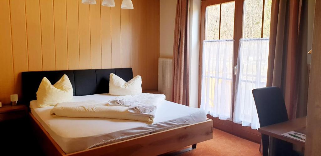 Postel nebo postele na pokoji v ubytování Hubertushof