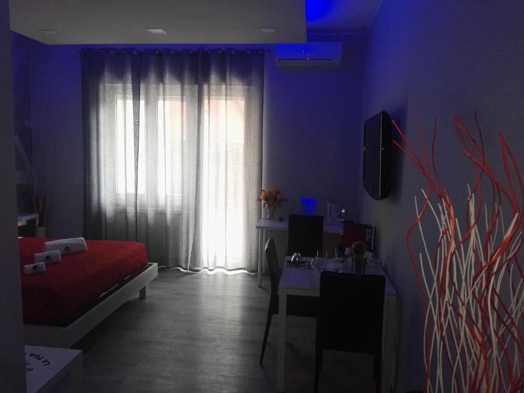 Postel nebo postele na pokoji v ubytování B&B da Lillo
