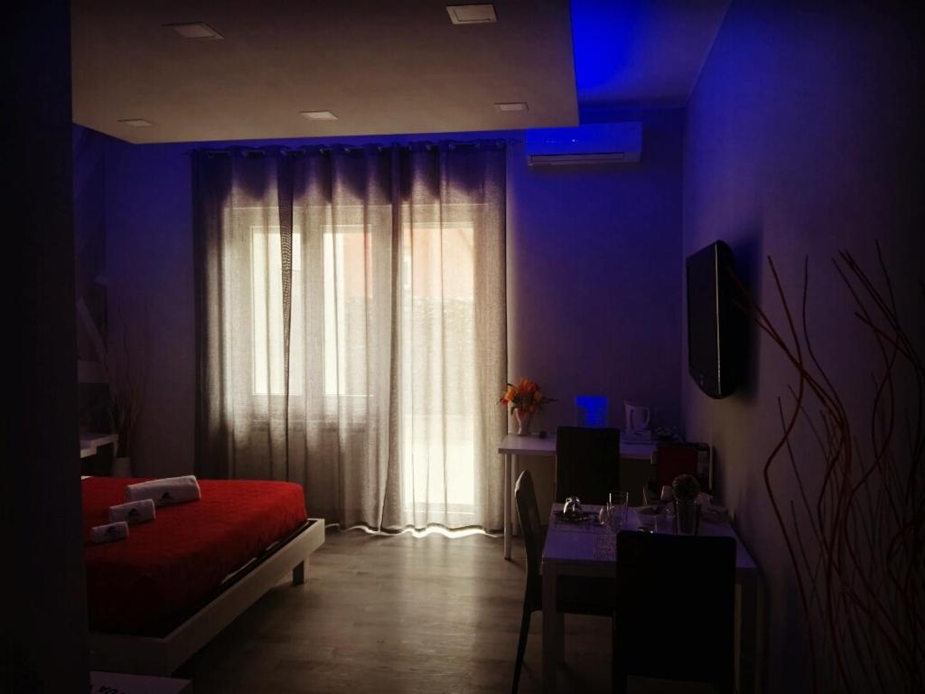 Postel nebo postele na pokoji v ubytování B&B da Lillo