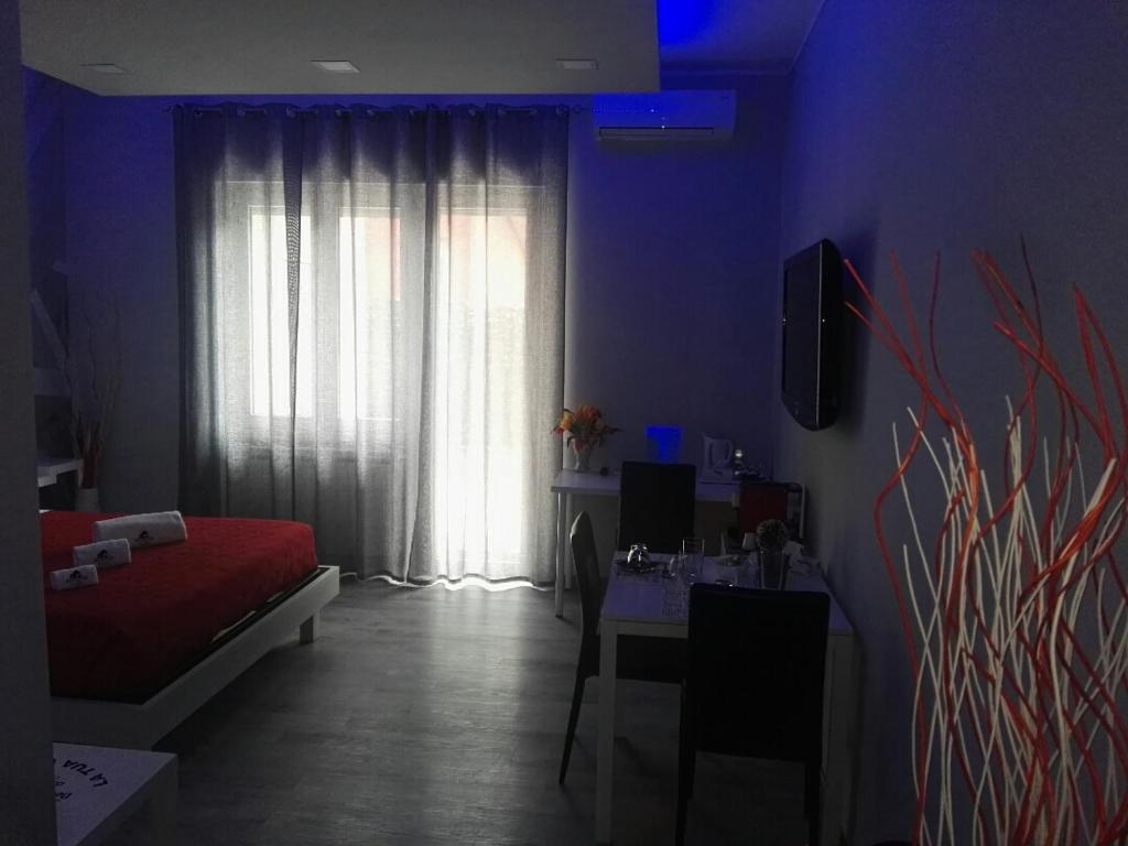 Postel nebo postele na pokoji v ubytování B&B da Lillo