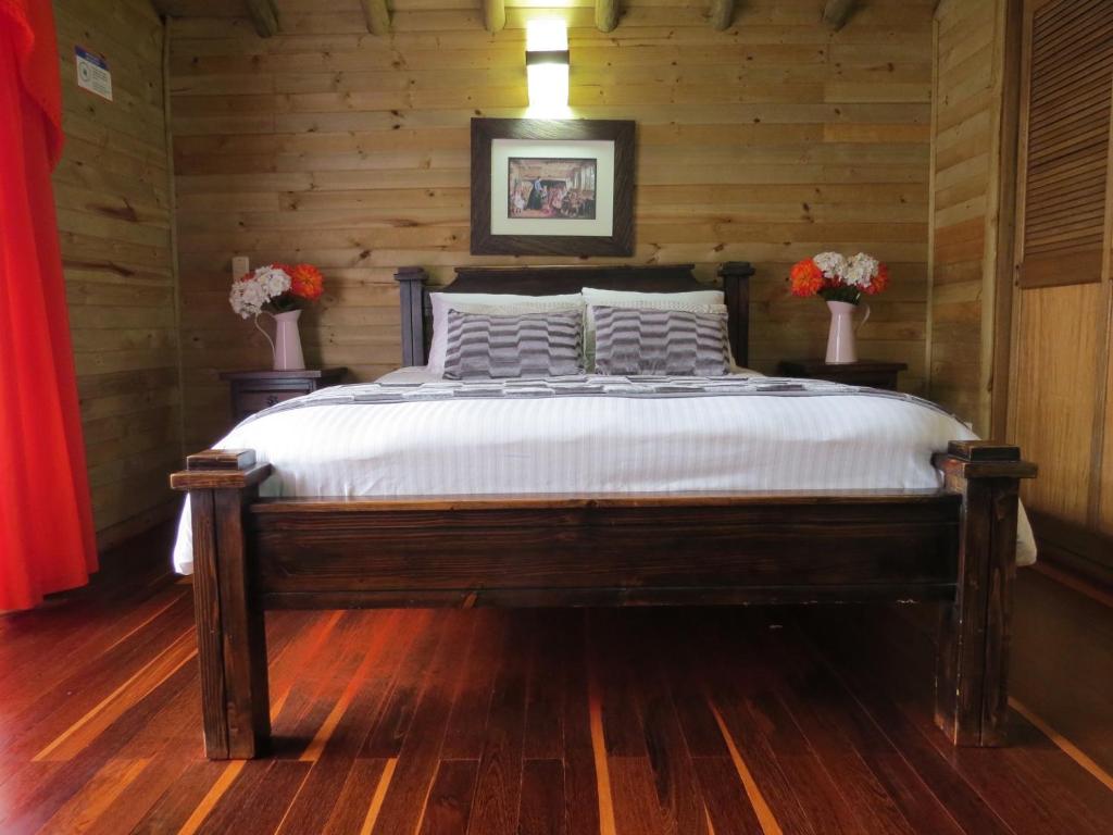 Cama o camas de una habitación en Cabañas Filadelfia