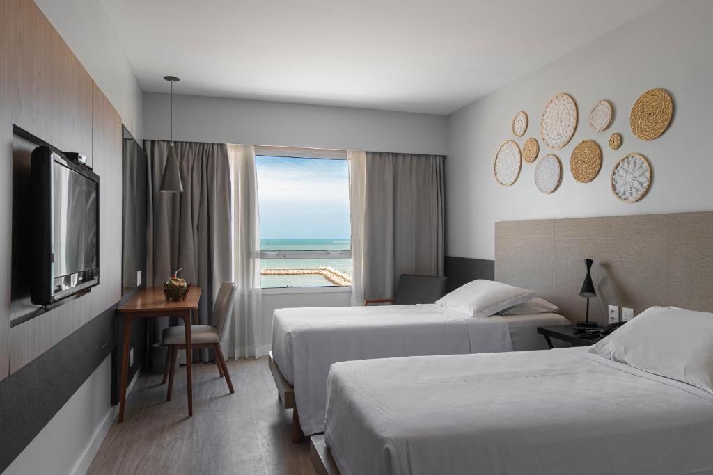 Postel nebo postele na pokoji v ubytování Praiano Hotel