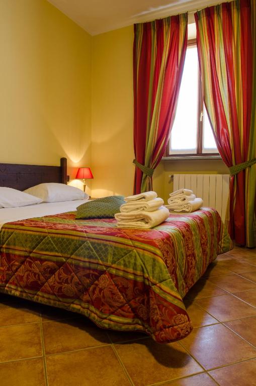 Postel nebo postele na pokoji v ubytování Hotel Oberje Dla Viere