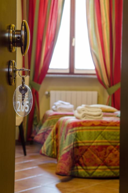 Postel nebo postele na pokoji v ubytování Hotel Oberje Dla Viere