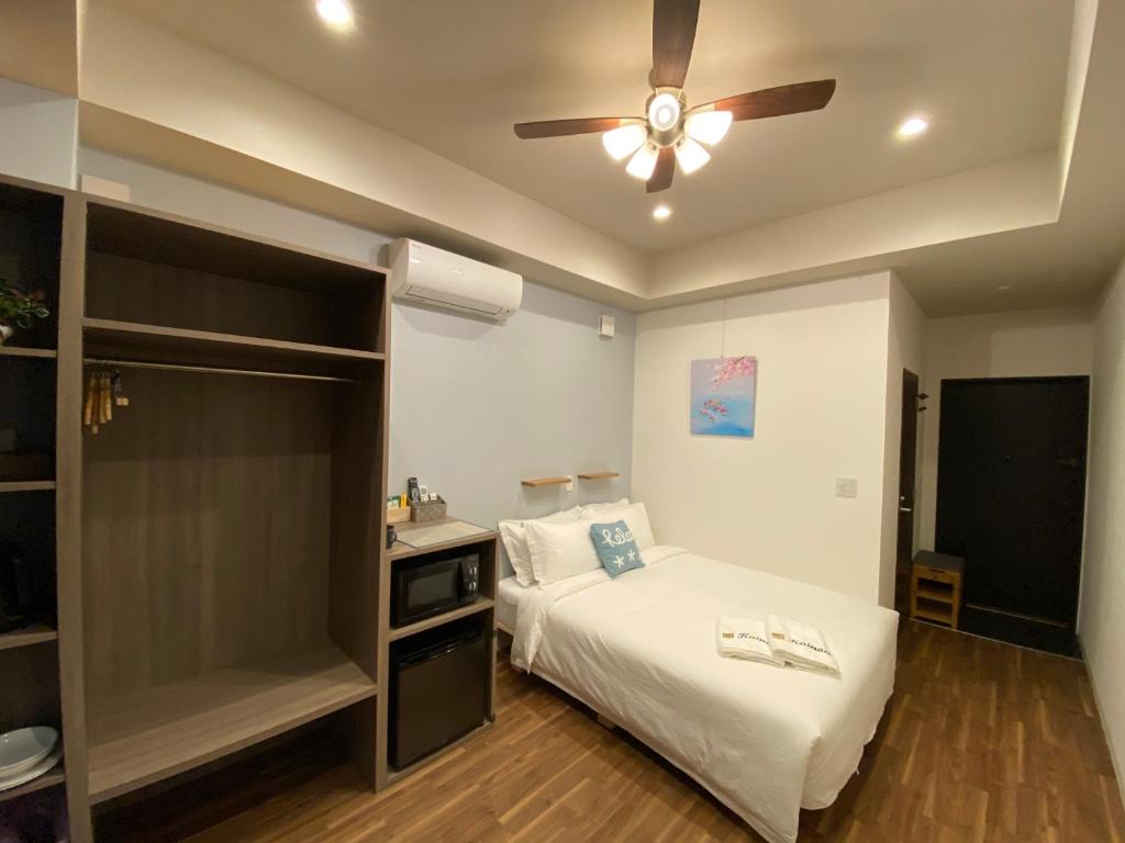Postel nebo postele na pokoji v ubytování Kainoa Guesthouse