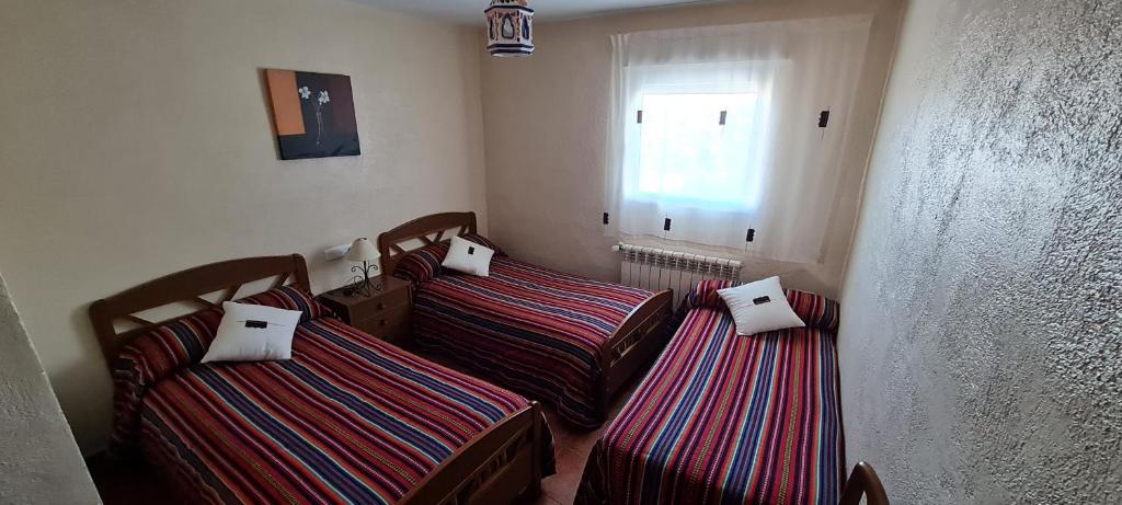 Posteľ alebo postele v izbe v ubytovaní Apartamento Rural Coll d'Ares