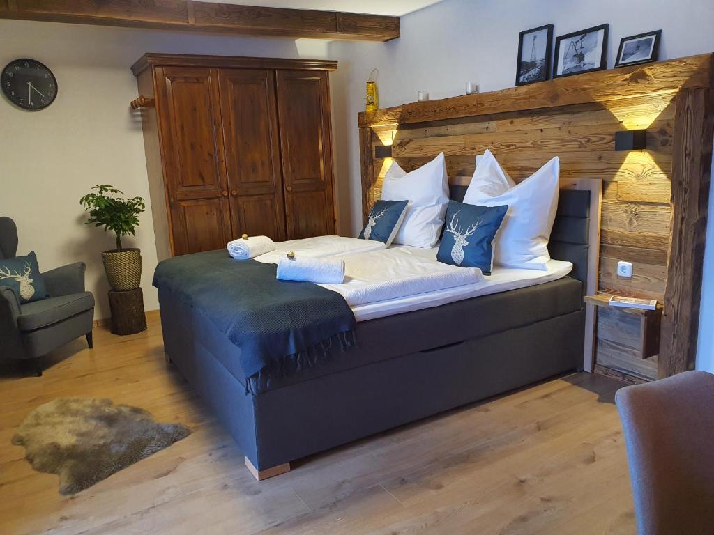 Postelja oz. postelje v sobi nastanitve Kozma Apartment Gerlitzen