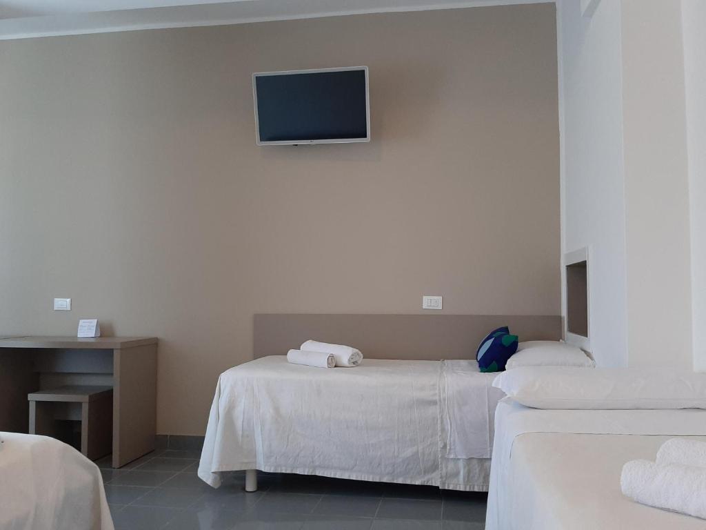 Postel nebo postele na pokoji v ubytování Hotel Desire'