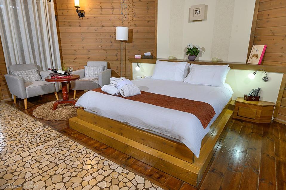 Letto o letti in una camera di Talia Cabin Guest & Spa
