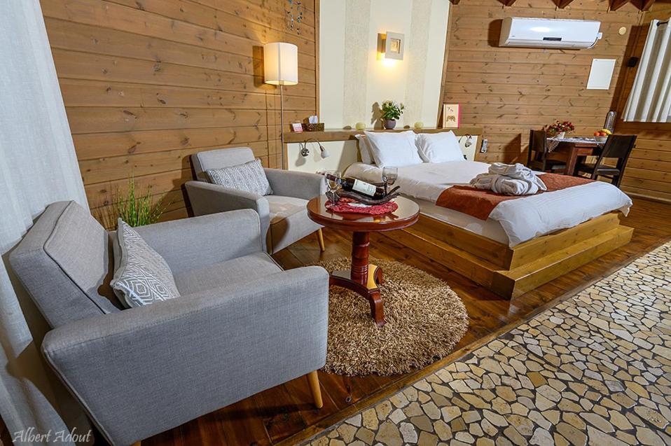 Area soggiorno di Talia Cabin Guest & Spa