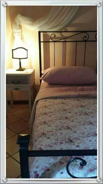 Postel nebo postele na pokoji v ubytování Hotel La Selce