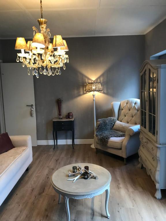 Posezení v ubytování Le petit béguinage