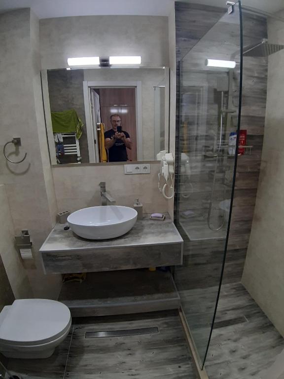 Koupelna v ubytování neu gudauri loft2 с видом на горы