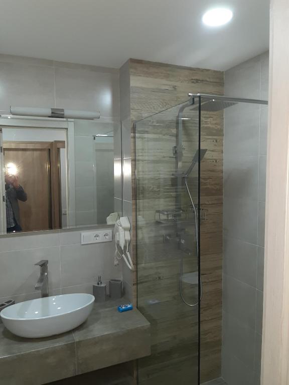 Koupelna v ubytování neu gudauri loft2 с видом на горы