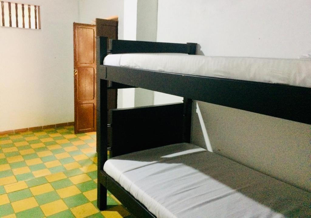 Llit o llits en una habitació de Hotel Solárium Posada