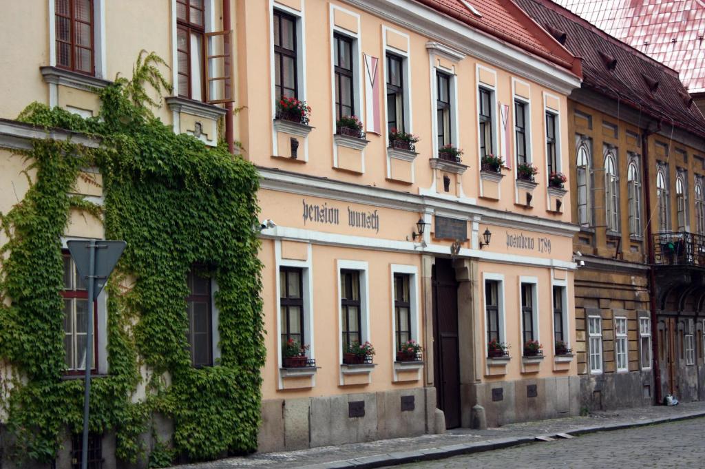 a building on the side of a street at Pension Wunsch in Jaroměř