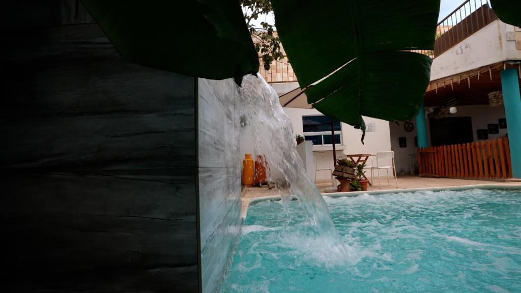 Bazén v ubytování Hotel Agua Dulce nebo v jeho okolí
