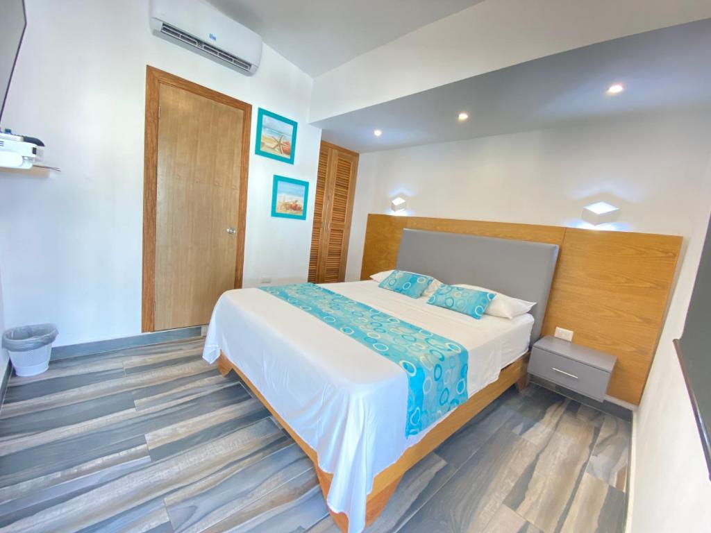 Postel nebo postele na pokoji v ubytování Hotel Agua Dulce