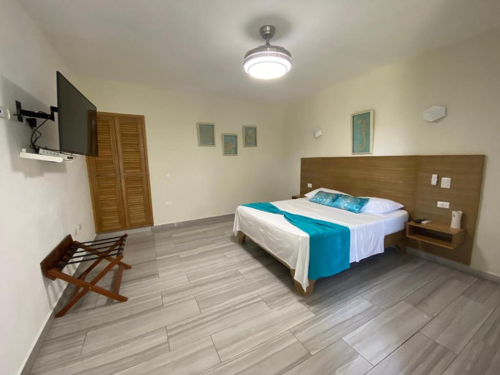 Postel nebo postele na pokoji v ubytování Hotel Agua Dulce