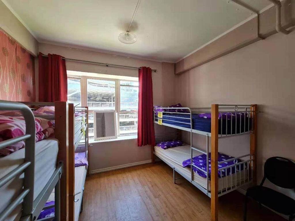 Postel nebo postele na pokoji v ubytování Frienz Backpacker