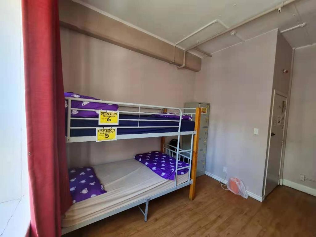 Postel nebo postele na pokoji v ubytování Frienz Backpacker