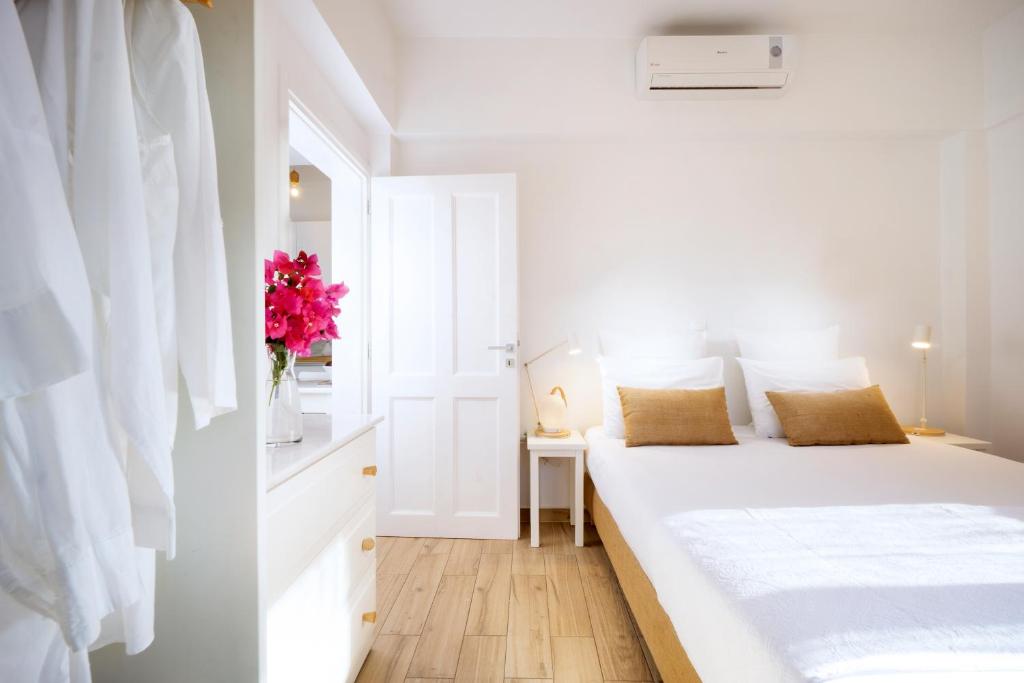 Postel nebo postele na pokoji v ubytování Almyrida Sands