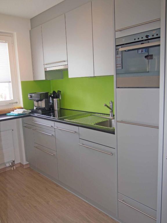 Kuchyň nebo kuchyňský kout v ubytování Ferienwohnung Helios