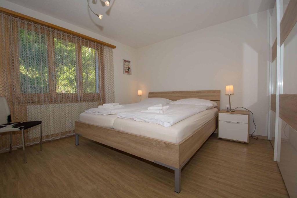 Postel nebo postele na pokoji v ubytování Ferienwohnung Helios