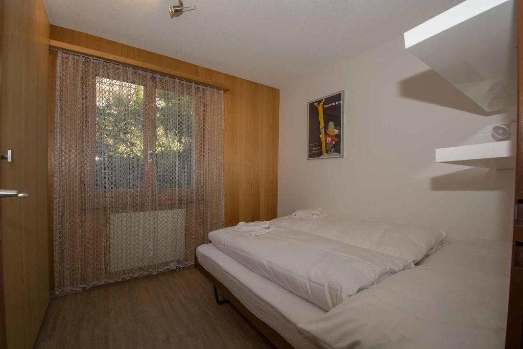 Postel nebo postele na pokoji v ubytování Ferienwohnung Helios