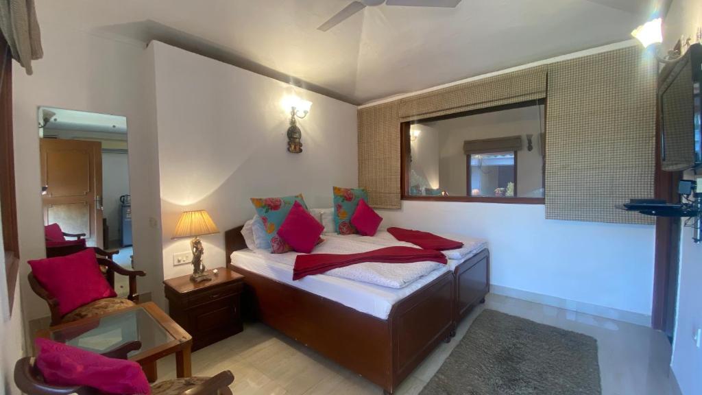 Postel nebo postele na pokoji v ubytování The Stay Inn New Delhi