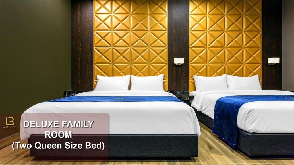 Postel nebo postele na pokoji v ubytování U3 HOTEL