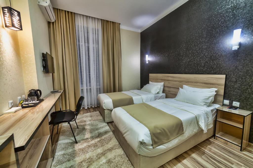 Postel nebo postele na pokoji v ubytování Level