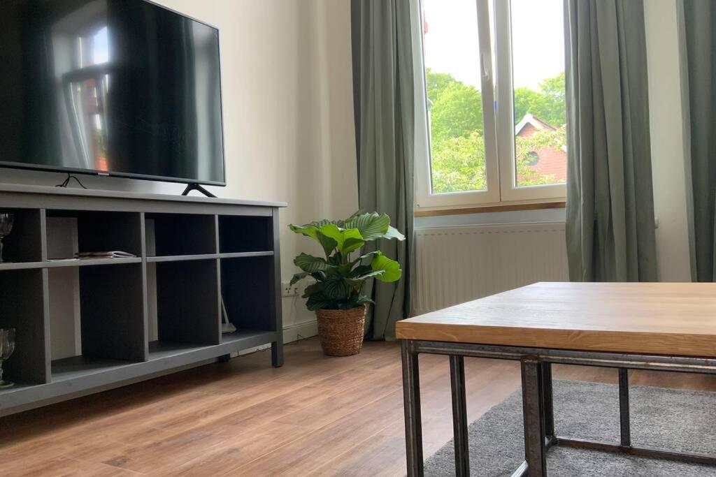 TV a/nebo společenská místnost v ubytování FeWoEcK Optimist