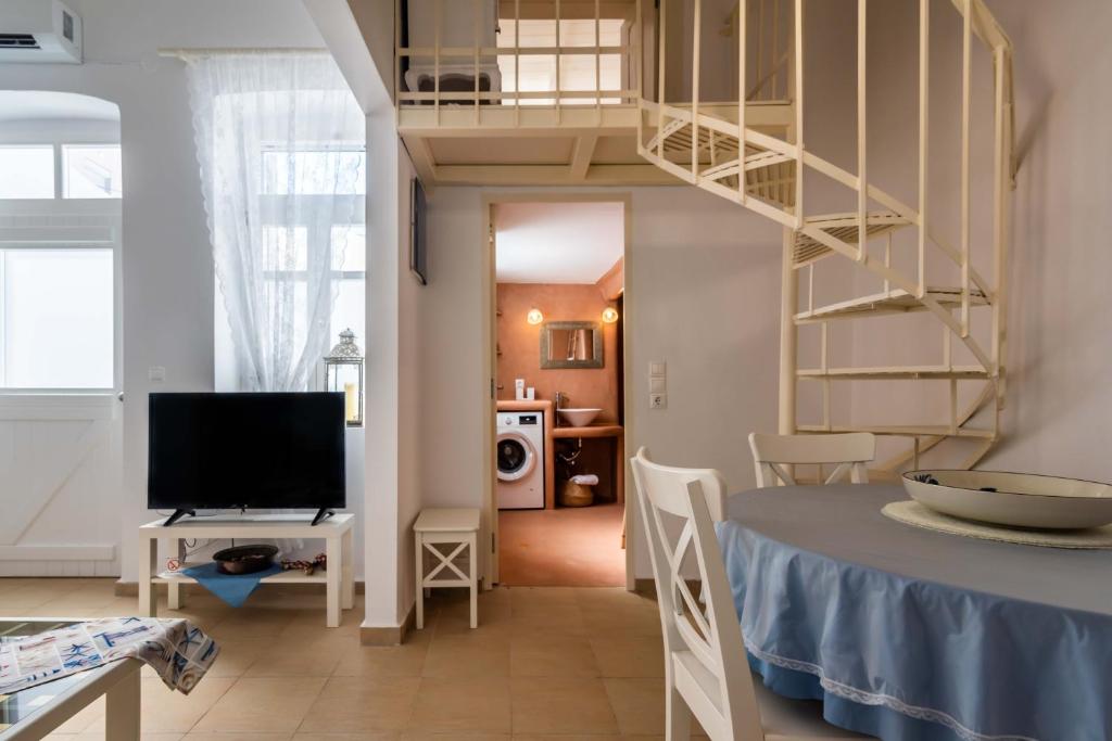 Televízia a/alebo spoločenská miestnosť v ubytovaní Casa Nostalgia