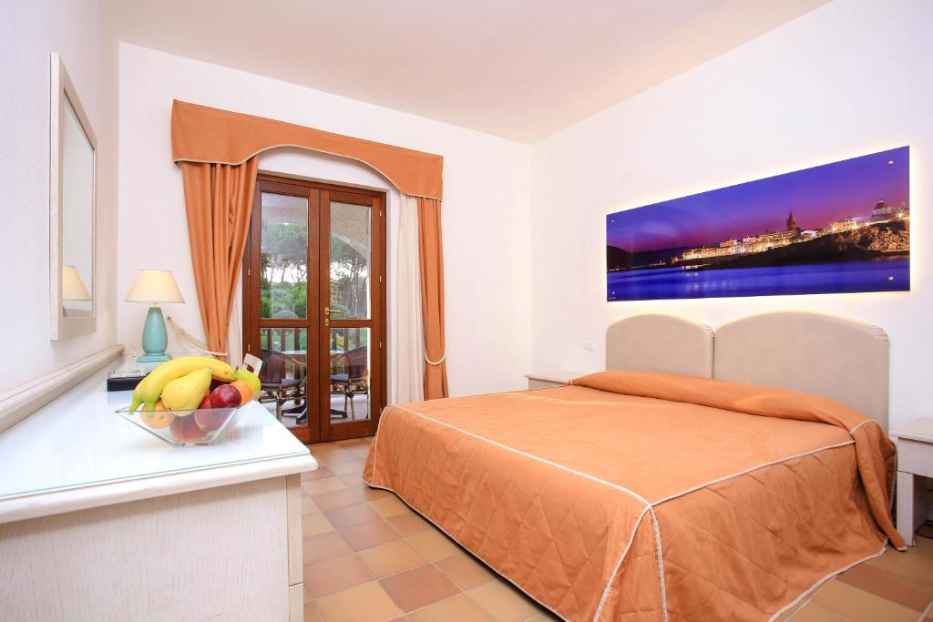 Een bed of bedden in een kamer bij Hotel Punta Negra