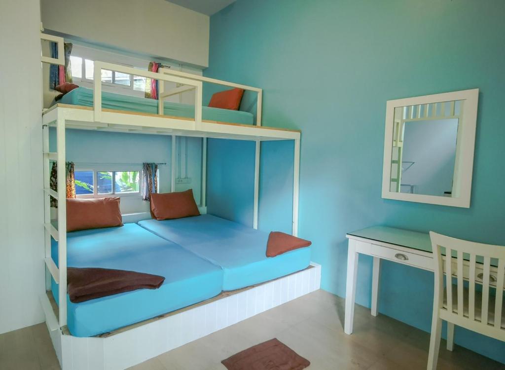 Postel nebo postele na pokoji v ubytování Glur Hostel