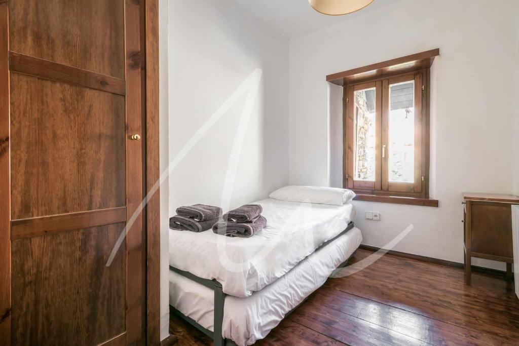 Posteľ alebo postele v izbe v ubytovaní Nin de Beret by SeaMount Rentals