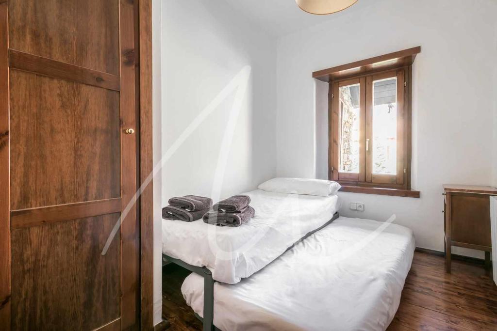 Posteľ alebo postele v izbe v ubytovaní Nin de Beret by SeaMount Rentals