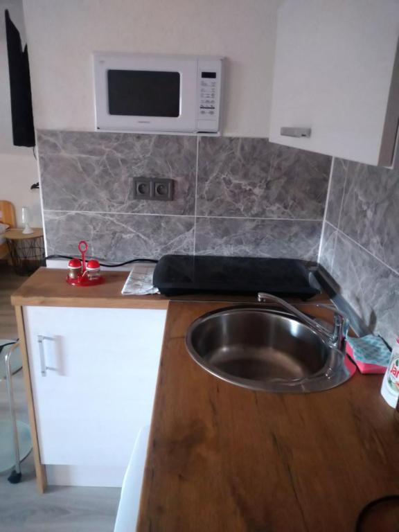 Kuchyň nebo kuchyňský kout v ubytování Apartmán POHODA Javorník