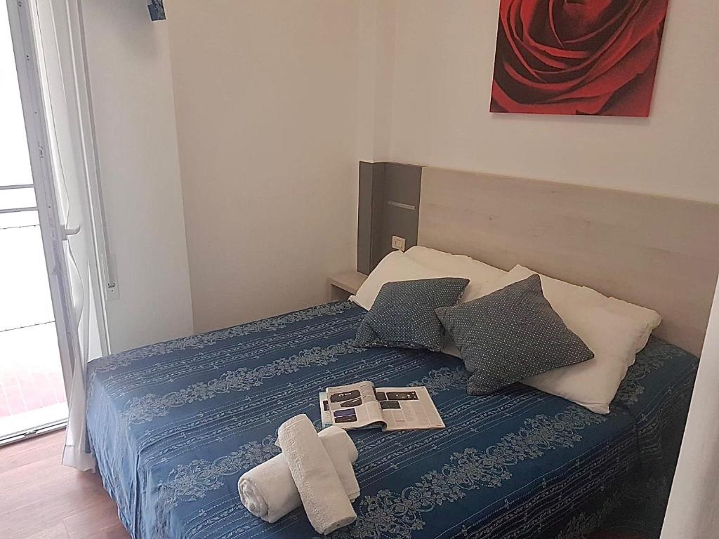 Postel nebo postele na pokoji v ubytování Hotel Arena