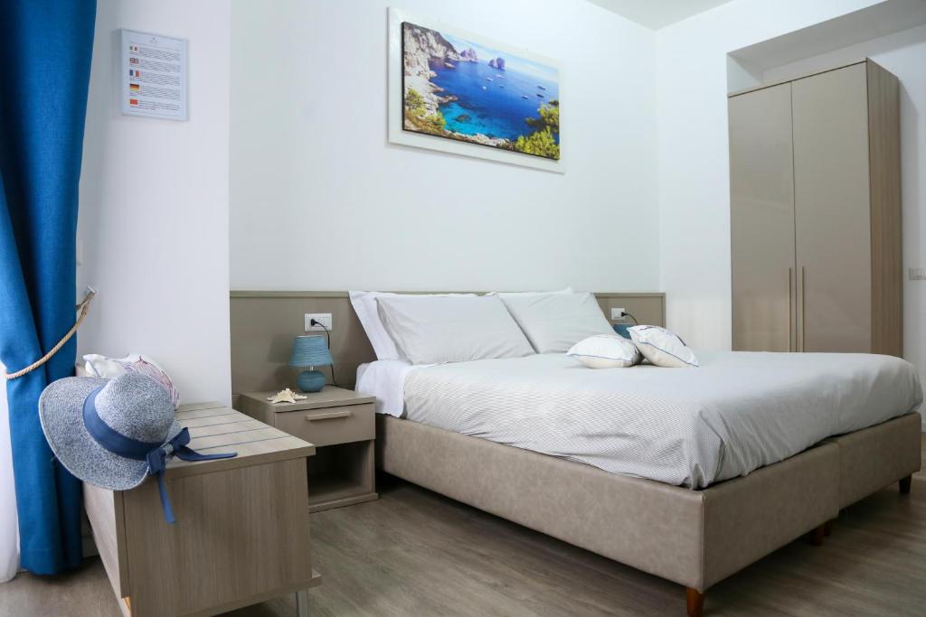 Postel nebo postele na pokoji v ubytování Al Parco II Rota B&B