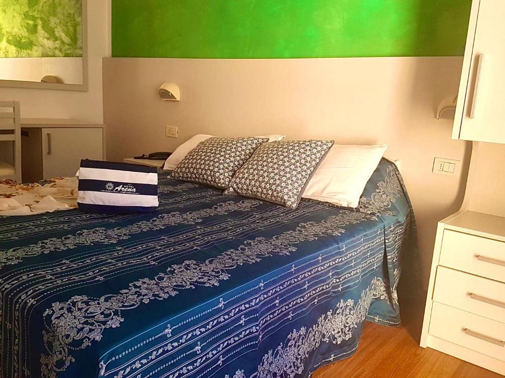Postel nebo postele na pokoji v ubytování Hotel Arena
