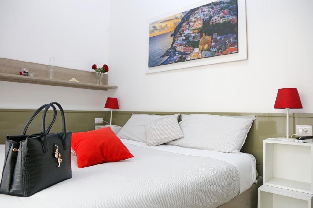 Postel nebo postele na pokoji v ubytování Al Parco II Rota B&B