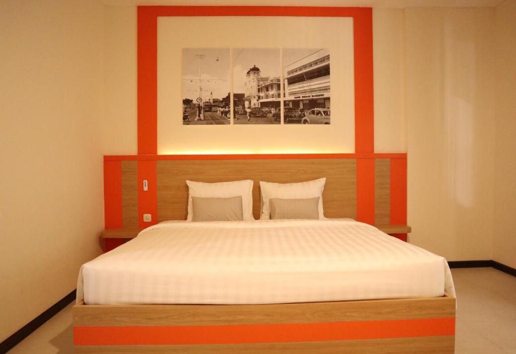 Postel nebo postele na pokoji v ubytování D'Carol Hotel