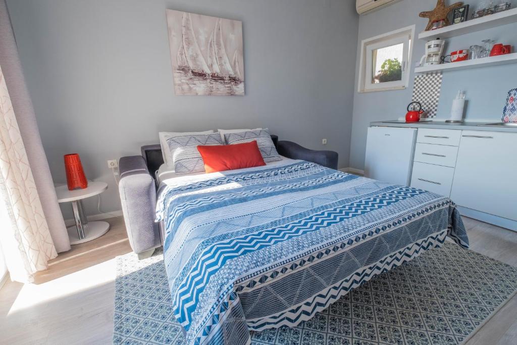 Postel nebo postele na pokoji v ubytování Apartmani Villa Mila