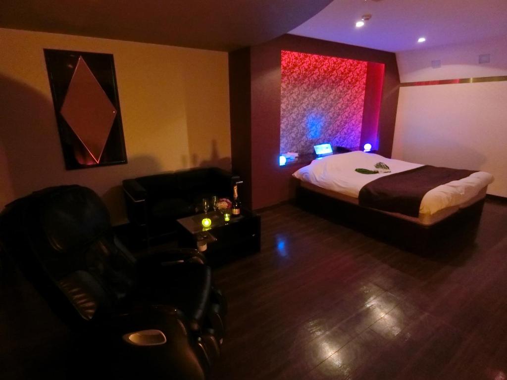 Postel nebo postele na pokoji v ubytování Kasama Shizu ( Love Hotel )