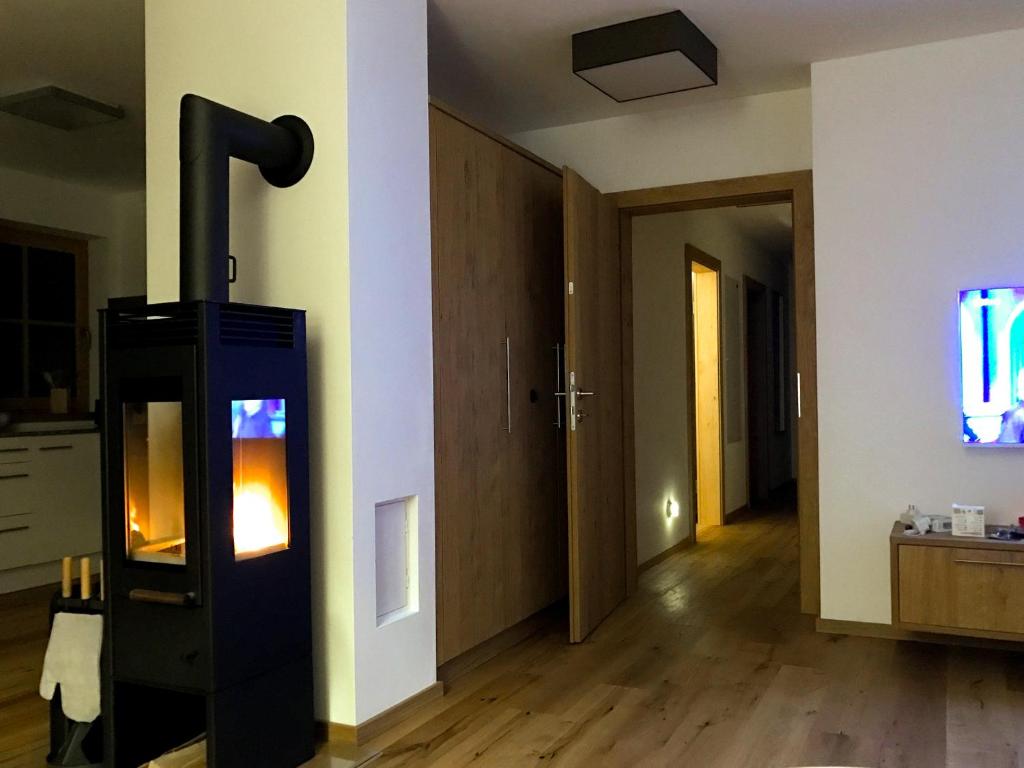 TV a/nebo společenská místnost v ubytování Alpin Residenzen Panoramabahn by Alpina-Holiday
