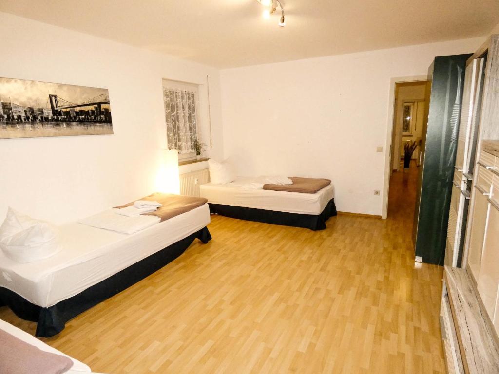 Katil atau katil-katil dalam bilik di SUNNYHOME Monteurwohnungen und Apartments nahe Regensburg